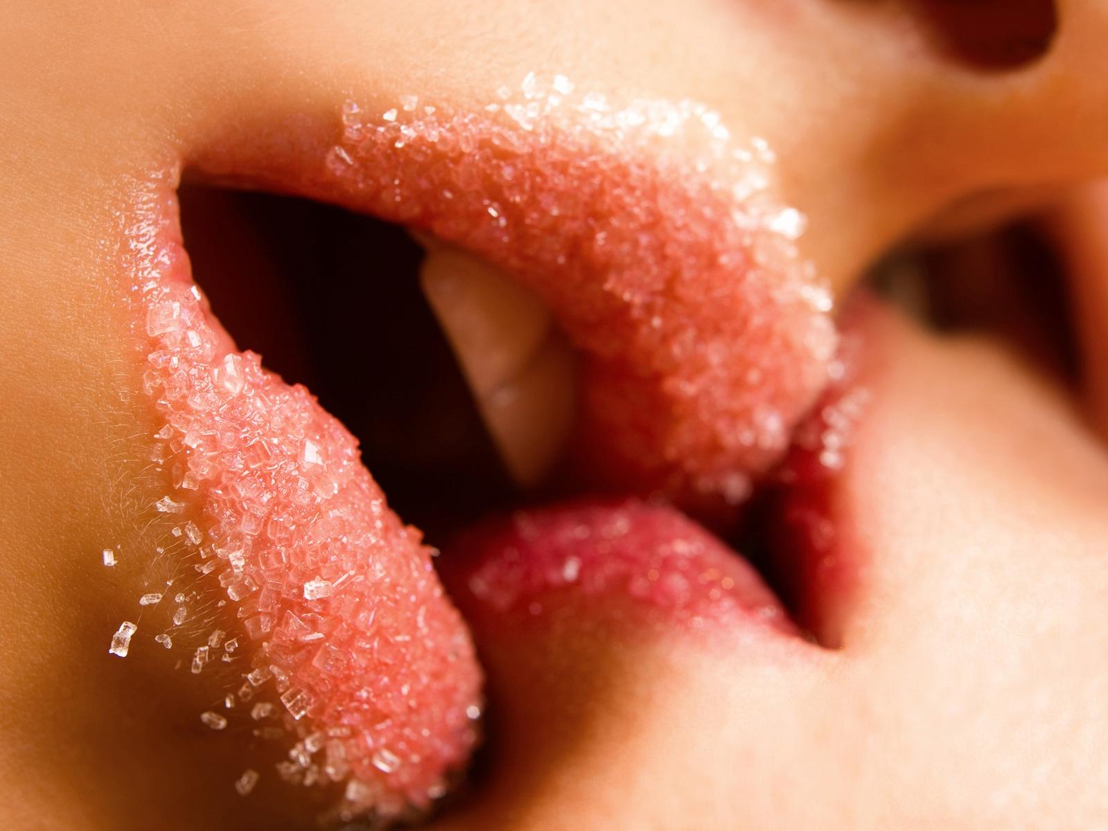 women kissing sugar lips