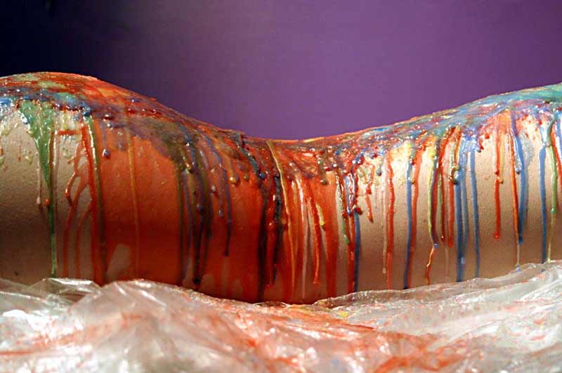 Colourful Rainbow of Wax on Womans Body Photo