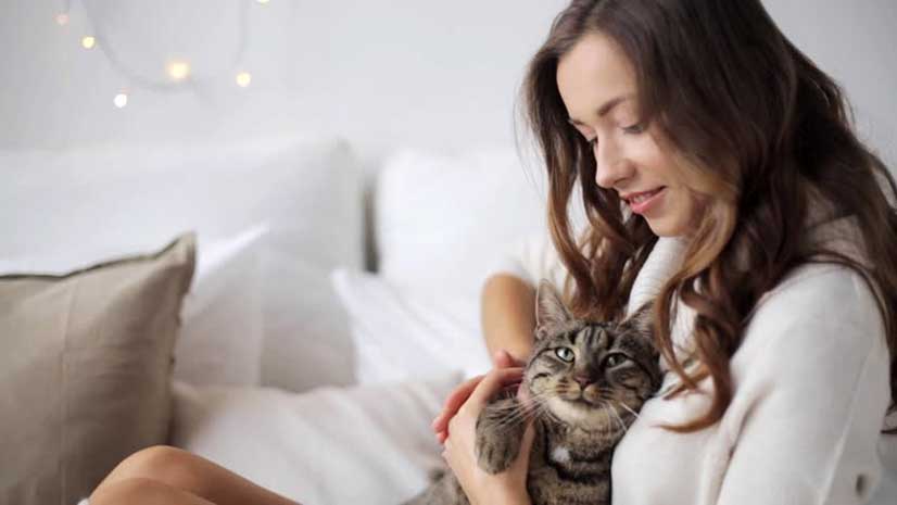 Woman Happy At Home With Pet