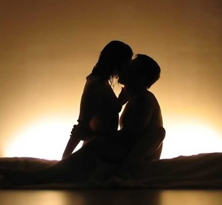 Couples engaging in tantric sex