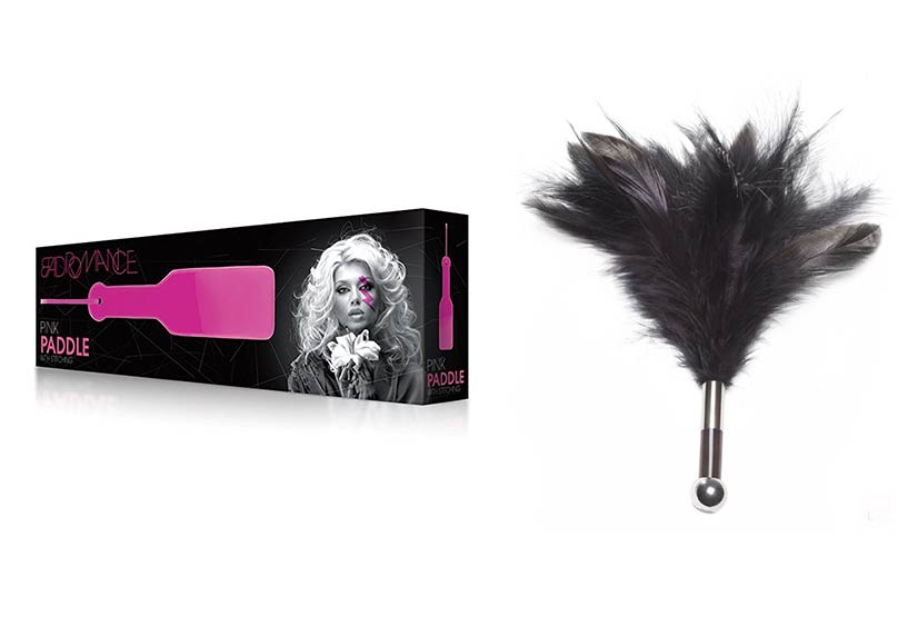 BDSM paddle and a feather tickler for sensory play