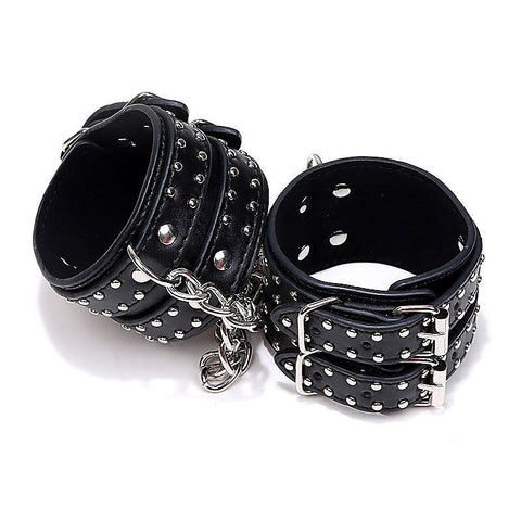 Studded Wrist Cuffs With Chain by BDStyle - Rabbit Vibrators